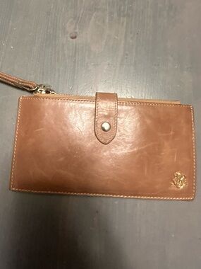 Borgasets wristlet wallet
Like new 
Fits all